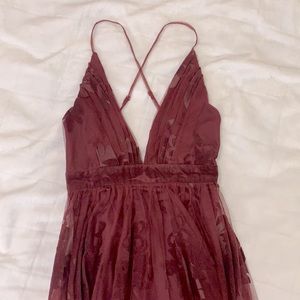 Stunning maroon dress.